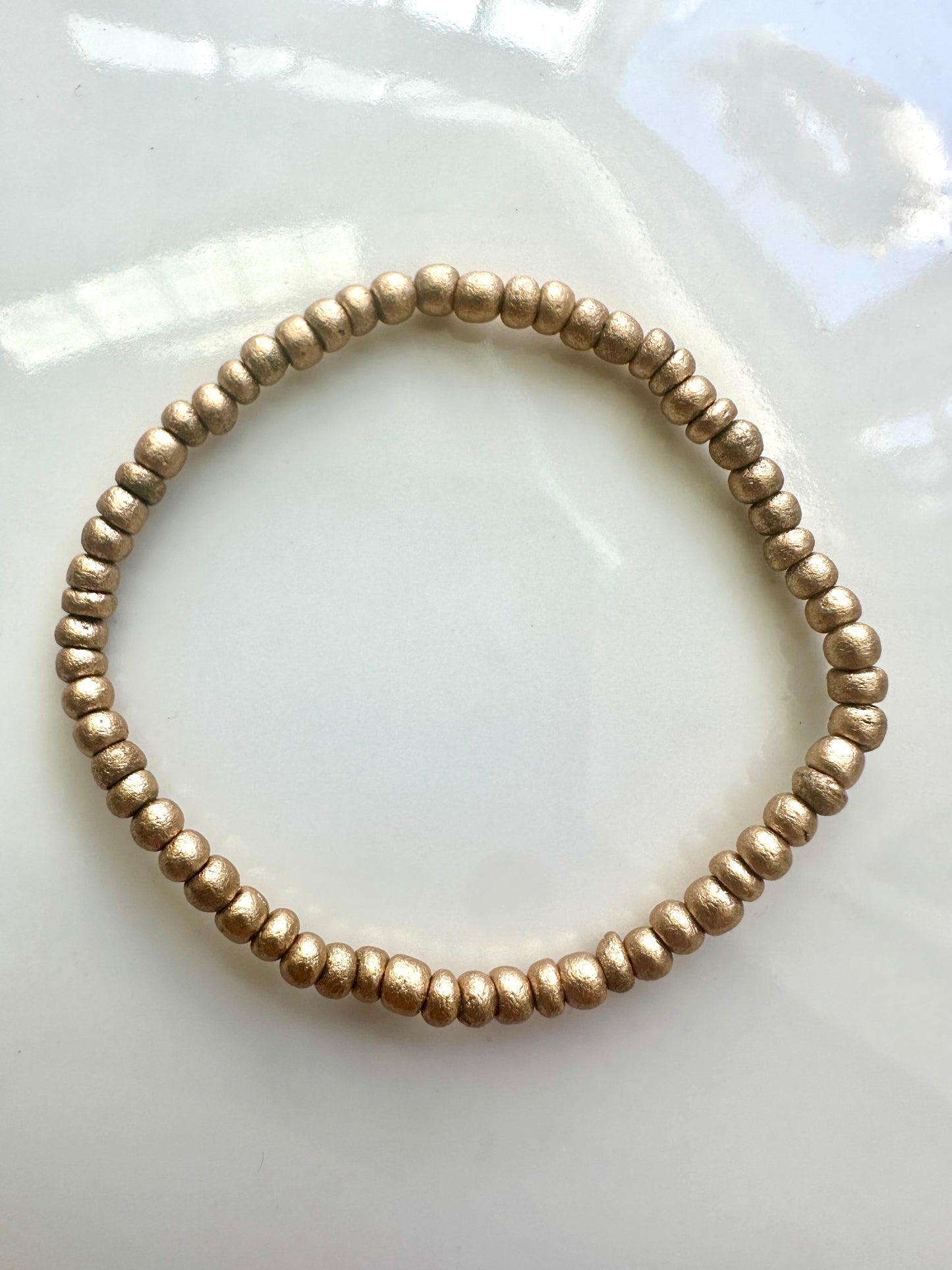 Tiny Gold Coconut Bracelet